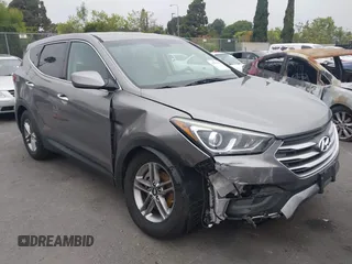 2018 Hyundai Santa Fe 2.4L with VIN 5XYZT3LB7JG569517, listed as a IAAI auction lot 42141100 with 57,854 mi miles and . Bid and sale history available at DreamBid. Image 1.