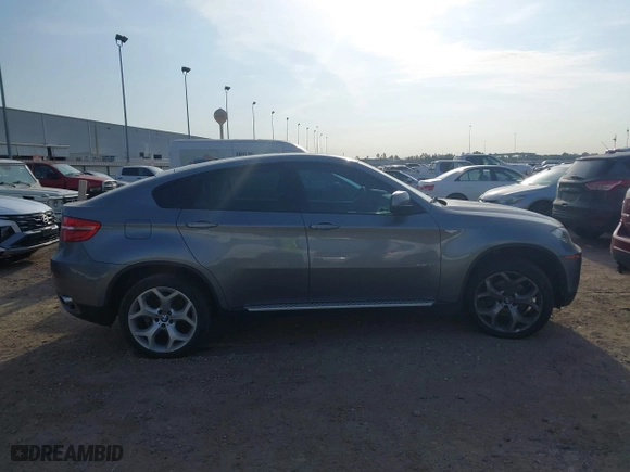 2014 BMW X6 xDrive35i with VIN 5UXFG2C58E0H11141, listed as a IAAI auction lot 42050279 with 191,119 mi miles. Bid and sale history available at carsss.com. Image 13.
