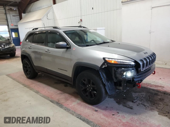 2017 Jeep Cherokee Trailhawk L Plus with VIN 1C4PJMBBXHW666051, listed as a Copart auction lot 51605455 with 99,259 mi miles and Salvage Title. Bid and sale history available at carsss.com. Image 4.