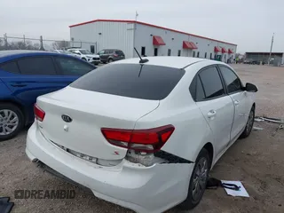 2019 Kia Rio S with VIN 3KPA24ABXKE215756, listed as a IAAI auction lot 41556461 with 122,300 mi miles. Bid and sale history available at carsss.com. Image 4.