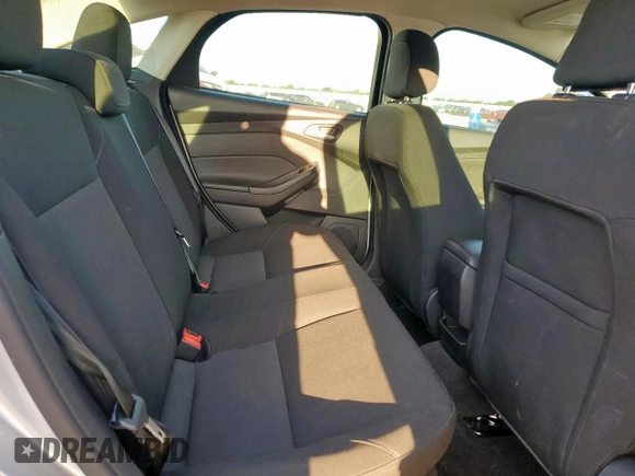 2018 Ford Focus SE z VIN 1FADP3F2XJL277462, wystawiony jako Copart lot #60360985 z przebiegiem 81 831 mil mil oraz Czysty tytuł • Clean title. Historia ofert i sprzedaży dostępna na DreamBid. Obrazek 10.