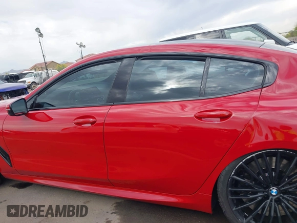 2022 BMW 8 Series M850i z VIN WBAGV8C04NCH90015, wystawiony jako IAAI lot #42020711 z przebiegiem 39 801 mil mil oraz . Historia ofert i sprzedaży dostępna na DreamBid. Obrazek 14.