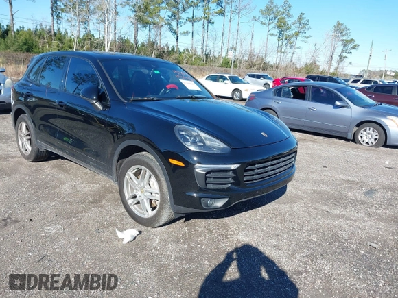 2016 Porsche Cayenne with VIN WP1AA2A21GLA02456, listed as a IAAI auction lot 41309026 with 136,266 mi miles. Bid and sale history available at carsss.com. Image 1.