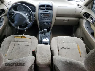 2005 Hyundai Santa Fe GLS z VIN KM8SC13D25U909602, wystawiony jako Copart lot #53751715 z przebiegiem Nie podano mil oraz Szkoda całkowita • Salvage title. Historia ofert i sprzedaży dostępna na DreamBid. Obrazek 8.
