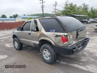 2000 Chevrolet Blazer LS с VIN 1GNCT18W7YK161195, выставлен на аукционе IAAI как лот 42329599 с пробегом 122 834 миль миль и . История ставок и продаж доступна на DreamBid. Изображение 3.