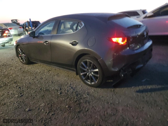 2019 Mazda Mazda3 Hatchback with VIN JM1BPBJM4K1125131, listed as a Copart auction lot 82978154 with 35,555 mi miles and Salvage Title. Bid and sale history available at carsss.com. Image 2.