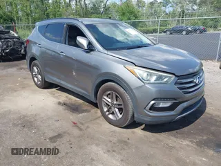 2017 Hyundai Santa Fe 2.4L z VIN 5NMZU3LB7HH025791, wystawiony jako IAAI lot #42277964 z przebiegiem 154 110 mil mil oraz . Historia ofert i sprzedaży dostępna na DreamBid. Obrazek 1.