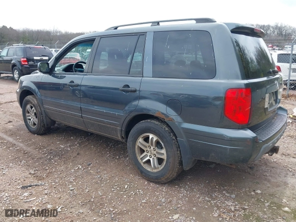 2004 Honda Pilot EX with VIN 2HKYF18494H557884, listed as a IAAI auction lot 42075748 with 205,723 mi miles. Bid and sale history available at carsss.com. Image 3.