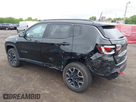 2019 Jeep Compass Trailhawk with VIN 3C4NJDDB7KT727762, listed as a IAAI auction lot 42299260 with 56,733 mi miles and . Bid and sale history available at DreamBid. Image 6.