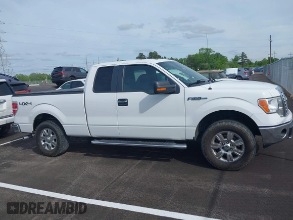 2012 Ford F-150 XL with VIN 1FTFX1EF1CFB32694, listed as a IAAI auction lot 42048993 with 144,091 mi miles. Bid and sale history available at carsss.com. Image 13.
