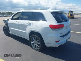 2015 Jeep Grand Cherokee Summit with VIN 1C4RJEJG5FC105038, listed as a IAAI auction lot 42555024 with 133,077 mi miles and . Bid and sale history available at DreamBid. Image 3.