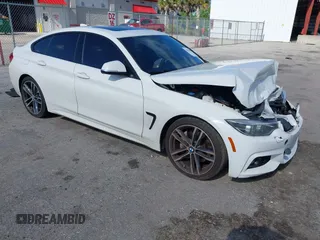 2019 BMW 4 Series 440i with VIN WBA4J5C56KBM65972, listed as a IAAI auction lot 42515096 with 73,984 mi miles and . Bid and sale history available at DreamBid. Image 1.