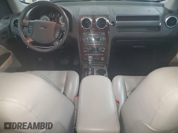 2008 Ford Taurus X Limited with VIN 1FMDK06W18GA03821, listed as a Copart auction lot 53123935 with 147,333 mi miles and Salvage title. Bid and sale history available at DreamBid. Image 8.