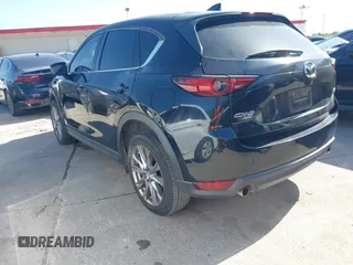 2019 Mazda CX-5 Grand Touring with VIN JM3KFBDM2K0564047, listed as a IAAI auction lot 42000455 with 152,590 mi miles and . Bid and sale history available at carsss.com. Image 3.