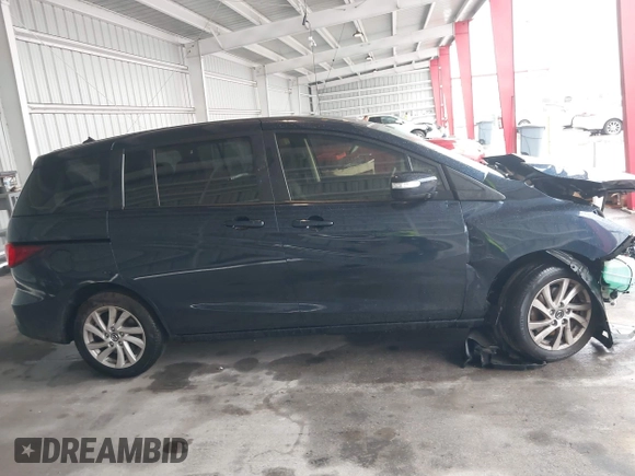 2014 Mazda 5 Sport с VIN JM1CW2BL4E0172683, выставлен на аукционе IAAI как лот 42235768 с пробегом 62 939 миль миль и . История ставок и продаж доступна на DreamBid. Изображение 14.