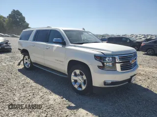 2015 Chevrolet Suburban LTZ with VIN 1GNSCKKC9FR730908, listed as a Copart auction lot 75317724 with 167,626 mi miles and Clean Title. Bid and sale history available at DreamBid. Image 4.