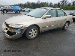 2000 Honda Accord SE with VIN 1HGCG6694YA088138, listed as a Copart auction lot 58641465 with 50,482 mi miles and Clean title. Bid and sale history available at DreamBid. Image 1.