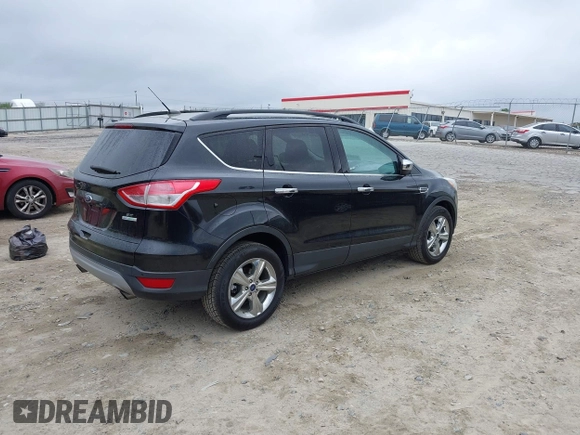 2015 Ford Escape SE with VIN 1FMCU0GX3FUC73452, listed as a IAAI auction lot 41923211 with 140,952 mi miles. Bid and sale history available at carsss.com. Image 4.