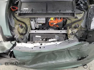 2024 Tesla Model Y Long Range z VIN 7SAYGAEEXRF987104, wystawiony jako Copart lot #54056015 z przebiegiem 24 027 mil mil oraz Szkoda całkowita • Salvage title. Historia ofert i sprzedaży dostępna na DreamBid. Obrazek 11.