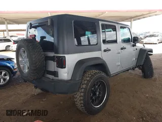 2010 Jeep Wrangler Unlimited Sport with VIN 1J4BA3H18AL161243, listed as a IAAI auction lot 41960370 with 89,004 mi miles. Bid and sale history available at carsss.com. Image 4.