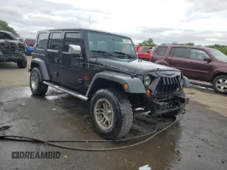 2008 Jeep Wrangler Unlimited Rubicon with VIN 1J4GA691X8L590979, listed as a Copart auction lot 57840575 with 195,458 mi miles and Salvage title. Bid and sale history available at DreamBid. Image 4.