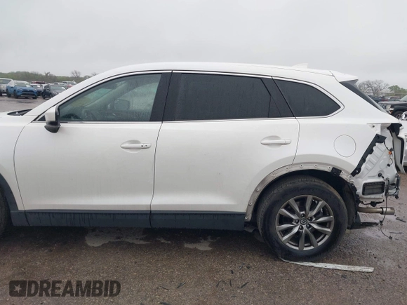2019 Mazda CX-9 Touring with VIN JM3TCACY2K0328347, listed as a IAAI auction lot 41917854 with 67,173 mi miles and . Bid and sale history available at DreamBid. Image 14.