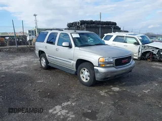 2004 GMC Yukon SLT with VIN 1GKEK13Z64J254137, listed as a IAAI auction lot 41499284 with 147,310 mi miles. Bid and sale history available at carsss.com. Image 1.