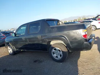 2006 Honda Ridgeline RT with VIN 2HJYK16296H551622, listed as a IAAI auction lot 41852291 with 266,964 mi miles. Bid and sale history available at carsss.com. Image 14.