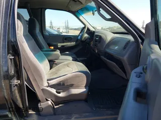 1999 Ford F-150 XL with VIN 2FTRX17L7XCA75886, listed as a IAAI auction lot 42831089 with Not provided miles and . Bid and sale history available at DreamBid. Image 5.