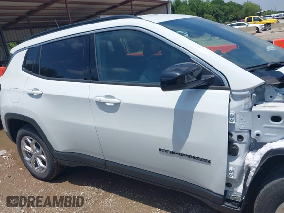 2024 Jeep Compass Latitude with VIN 3C4NJDBN6RT132814, listed as a IAAI auction lot 42437911 with 32,189 mi miles and . Bid and sale history available at DreamBid. Image 13.