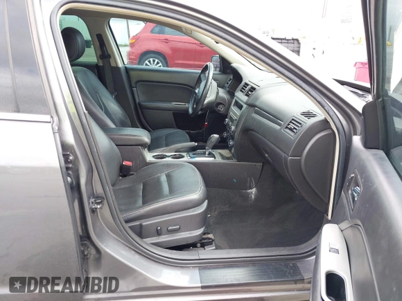2012 Ford Fusion SEL z VIN 3FAHP0JA1CR144687, wystawiony jako IAAI lot #42317054 z przebiegiem 173 134 mil mil oraz . Historia ofert i sprzedaży dostępna na DreamBid. Obrazek 5.