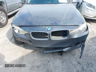 2015 BMW 3 Series 328i with VIN WBA3A5G55FNS90446, listed as a IAAI auction lot 41828658 with 124,867 mi miles. Bid and sale history available at carsss.com. Image 6.