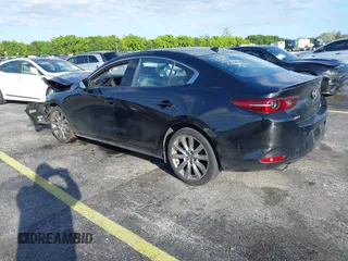 2021 Mazda 3 Premium with VIN JM1BPADL7M1303484, listed as a IAAI auction lot 41666785 with 34,476 mi miles and . Bid and sale history available at DreamBid. Image 3.