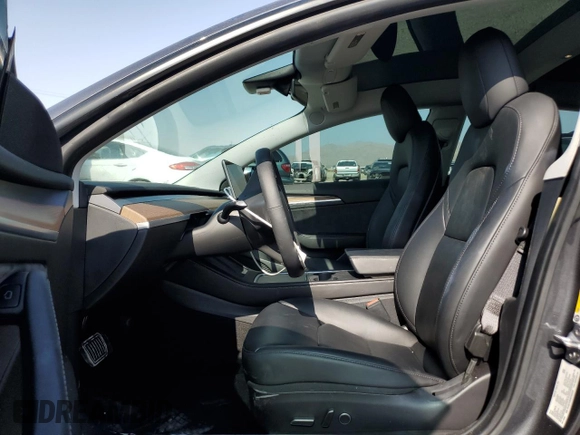 2021 Tesla Model 3 Long Range z VIN 5YJ3E1EB0MF005205, wystawiony jako Copart lot #63552954 z przebiegiem 24 691 mil mil oraz Szkoda całkowita • Salvage title. Historia ofert i sprzedaży dostępna na DreamBid. Obrazek 7.