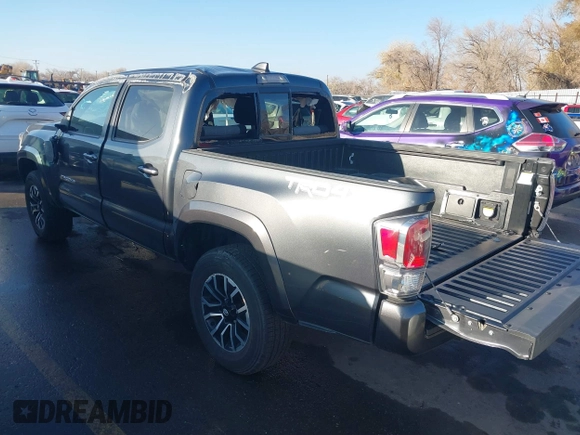 2023 Toyota Tacoma SR with VIN 3TMCZ5AN2PM553928, listed as a IAAI auction lot 40999044 with 9,210 mi miles and . Bid and sale history available at DreamBid. Image 3.