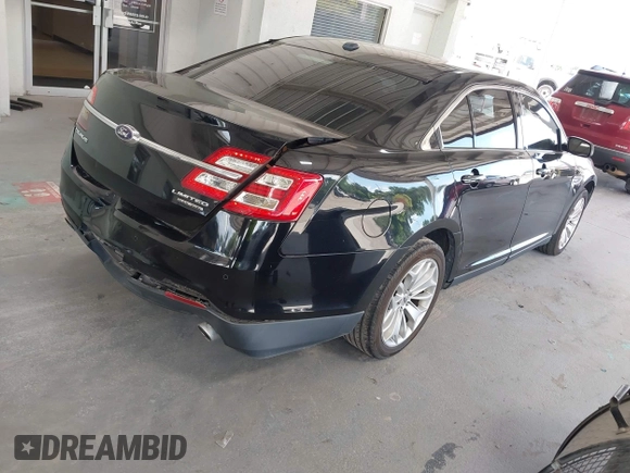 2017 Ford Taurus Limited z VIN 1FAHP2F81HG102598, wystawiony jako IAAI lot #42471410 z przebiegiem 165 386 mil mil oraz . Historia ofert i sprzedaży dostępna na DreamBid. Obrazek 4.