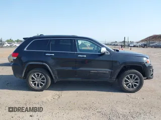2014 Jeep Grand Cherokee Limited z VIN 1C4RJFBGXEC200729, wystawiony jako IAAI lot #42415661 z przebiegiem 304 061 mil mil oraz . Historia ofert i sprzedaży dostępna na DreamBid. Obrazek 13.
