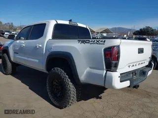 2019 Toyota Tacoma 4WD SR with VIN 3TMCZ5AN3KM277204, listed as a IAAI auction lot 41278640 with 78,930 mi miles. Bid and sale history available at carsss.com. Image 3.
