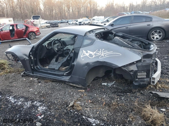 2010 Nissan 370Z with VIN JN1AZ4EH2AM506717, listed as a Copart auction lot 81713864 with NaN miles and Salvage Title. Bid and sale history available at carsss.com. Image 2.