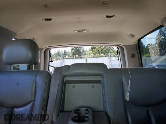 2005 GMC Yukon Denali z VIN 1GKEK63U55J143324, wystawiony jako Copart lot #59000695 z przebiegiem Nie podano mil oraz Szkoda całkowita • Salvage title. Historia ofert i sprzedaży dostępna na DreamBid. Obrazek 10.
