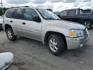 2006 GMC Envoy SLE with VIN 1GKDT13S462228967, listed as a Copart auction lot 73669484 with 233,349 mi miles and Salvage Title. Bid and sale history available at DreamBid. Image 4.