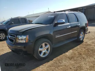 2009 Chevrolet Tahoe LTZ with VIN 1GNFK33029R292705, listed as a Copart auction lot 64842015 with 114,934 mi miles and Salvage title. Bid and sale history available at DreamBid. Image 1.