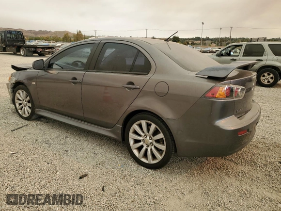 2011 Mitsubishi Lancer GTS with VIN JA32U8FW2BU005251, listed as a Copart auction lot 70879824 with 124,317 mi miles and Salvage Title. Bid and sale history available at carsss.com. Image 2.