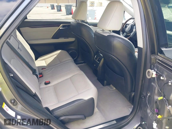 2017 Lexus RX 350 z VIN 2T2ZZMCA7HC035348, wystawiony jako IAAI lot #42357182 z przebiegiem 88 934 mil mil oraz . Historia ofert i sprzedaży dostępna na DreamBid. Obrazek 8.
