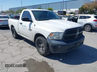 2014 Ram 1500 Tradesman z VIN 3C6JR6AG2EG264341, wystawiony jako IAAI lot #42386869 z przebiegiem 299 432 mil mil oraz . Historia ofert i sprzedaży dostępna na DreamBid. Obrazek 1.