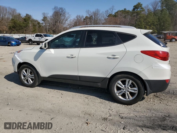2013 Hyundai Tucson GLS with VIN KM8JU3AC1DU606047, listed as a Copart auction lot 48692885 with 185,829 mi miles and Salvage Title. Bid and sale history available at carsss.com. Image 2.