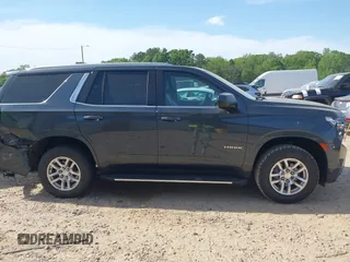 2021 Chevrolet Tahoe LT z VIN 1GNSKNKD4MR250981, wystawiony jako IAAI lot #42092550 z przebiegiem 89 414 mil mil oraz . Historia ofert i sprzedaży dostępna na DreamBid. Obrazek 13.