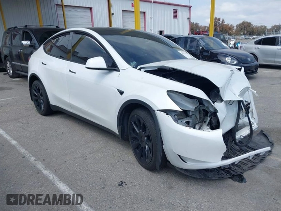 2023 Tesla Model Y Long Range with VIN 7SAYGDEE9PA026005, listed as a IAAI auction lot 41895223 with 43,813 mi miles and . Bid and sale history available at DreamBid. Image 1.