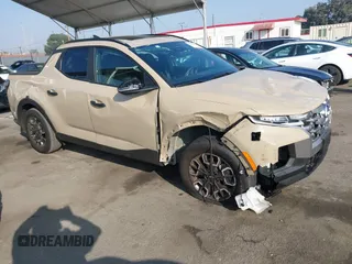 2023 Hyundai Santa Cruz SEL z VIN 5NTJC4AE8PH069157, wystawiony jako IAAI lot #40991087 z przebiegiem 7421 mil mil oraz . Historia ofert i sprzedaży dostępna na DreamBid. Obrazek 1.