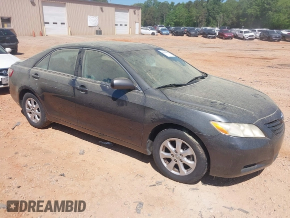 2007 Toyota Camry CE with VIN 4T1BE46K47U665377, listed as a IAAI auction lot 42133285 with 157,396 mi miles. Bid and sale history available at carsss.com. Image 1.